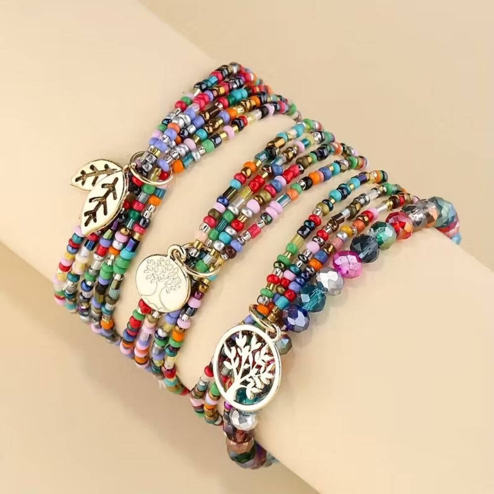 Beaded Stretch Bracelet With Gold Leaves